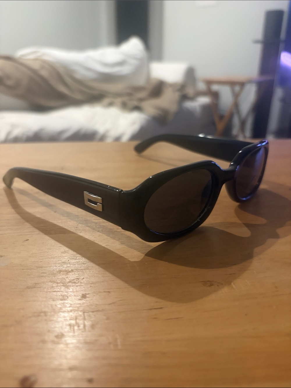 Guess Black Oval Sunglasses with Silver Logo